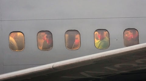 Migrants deported months ago by the United States to El Salvador under the Trump administration's immigration crackdown arrive at Simon Bolívar International Airport, in Maiquetia, Venezuela, July 18, 2025.