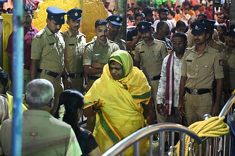 Chief Priest Gnanendra Swamy prepares to carry the Karaga on the final day of the festival in Bengaluru on Wednesday.
