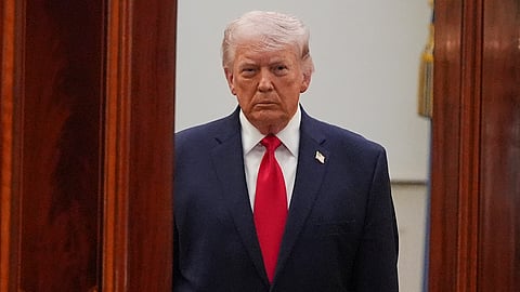 President Donald Trump arrives from the Blue Room to speak about the Iran war from the Cross Hall of the White House on Wednesday, April 1, 2026, in Washington.