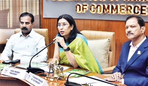 FKCCI presiden Uma Reddy addresses the media on Friday