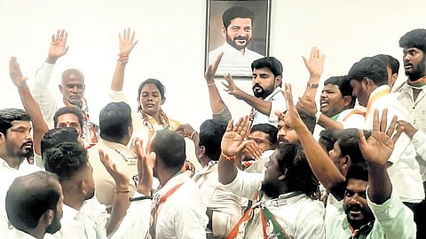 Led by District Congress Committee president Anksha Reddy, a group of workers went to the camp office and installed a photograph of Chief Minister A Revanth Reddy,