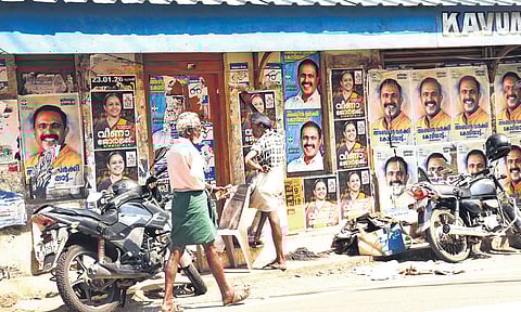 A physically challenged man selling lotteries on the roadside in Aranmula constituency.