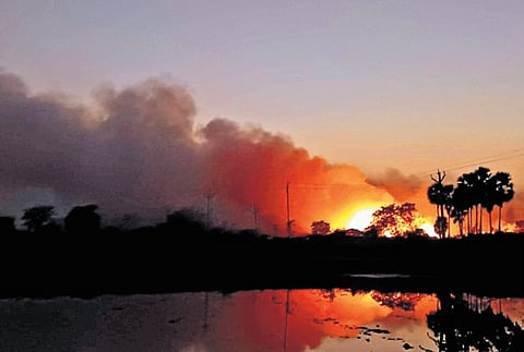 Smoke billows from burning garbage
at Chandanapalli in Nalgonda