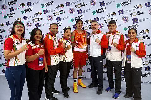 Jaismine Lamboria (centre) with head coach Santiago Nieva and rest of the support staff