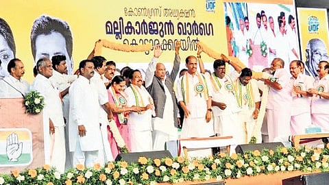 Congress president Mallikarjun Kharge with UDF candidates Aisha Potty, M M Naseer, Noushad Younus, Jyothikumar Chamakkala and Ullas Kovoor at an election meeting in Kottarakkara on Sunday