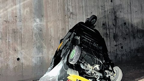 The mangled remains of autorickshaw that fell into a nearly 30-foot-deep trench near Nemom on Sunday