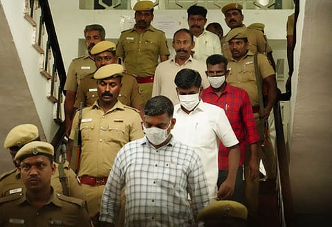 The policemen convicted in the Sathankulam custodial death case being taken away from the court premises after receiving death sent