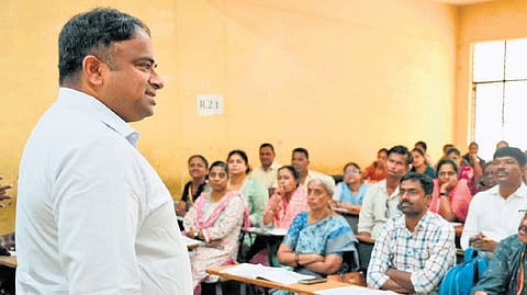 West City Corporation Commissioner K V Rajendra interacts with enumerators and supervisors during a training session on Monday