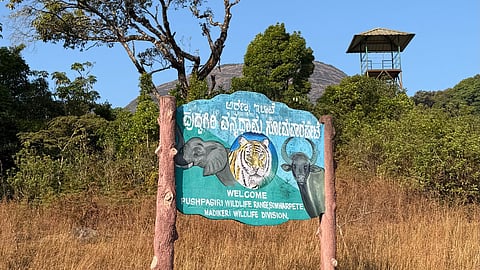 Board marking Pushpagiri wildlife range territory under Madikeri Wildlife Division.