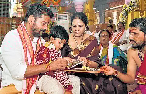 Chief Minister A Revanth Reddy performs his grandson’s Aksharabhyasam at
Sri Gnana Saraswathi Devi Devasthanam in Basara, Nirmal district on Monday