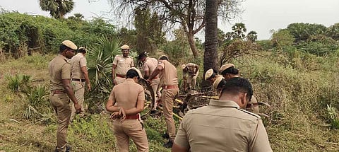 File | Police personnel inspect the spot where the firing incident took place at Maruthamuthur village in Tenkasi district.