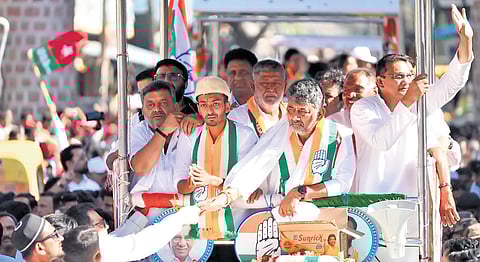 DCM DK Shivakumar held a road show on behalf of Congress candidate Samarth from Davangere South assembly constituency at Doddapet, Vitthal Mandir Main Road, Old Betur Road, Medina Circle, Azad Nagar and other places on Tuesday.
