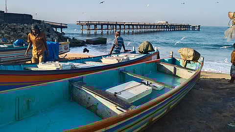 A view of the broken pier and the beach in Valiyathura.