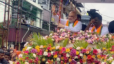 Union Home Minister Amit Shah takes out a roadshow as part of the NDA campaign in Haripad.