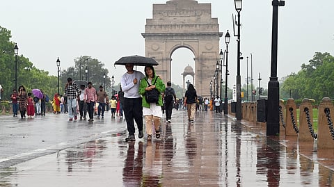 Rain lashes parts of the National Capital. IMD has issued a yellow alert in the city, in New Delhi on Tuesday.