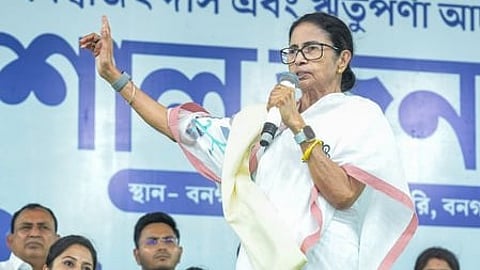 West Bengal Chief Minister Mamata Banerjee alleged that the saffron party of trying to manipulate the electoral rolls and offering money to woo voters.