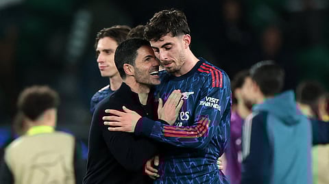 Arsenal's coach Mikel Arteta celebrates with Kai Havertz at the end of the UEFA Champions League quarter final first leg football match between Sporting CP and Arsenal at Jose Alvalade stadium in Lisbon on April 7, 2026.