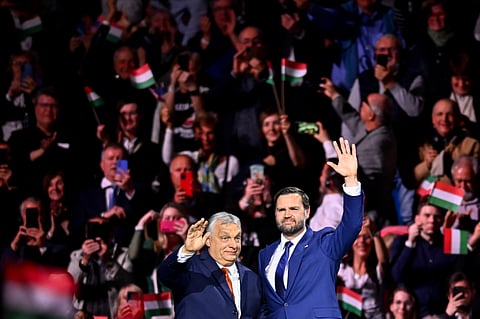 Hungary's Prime Minister Viktor Orban, left, and U.S. Vice President JD Vance wave to the audience at the end of a pre-election rally in Budapest, Hungary, Tuesday, April 7, 2026.