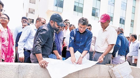 Additional Chief Secretary (UDD) Tushar Girinath, GBA Chief Commissioner M Maheshwar Rao and other officials inspect a flood-prone location on Friday.
