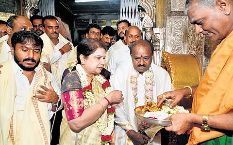 Union Minister HD Kumaraswamy along with his wife Anitha offer special prayers atop the Chamundi Hills in Mysuru on Friday.