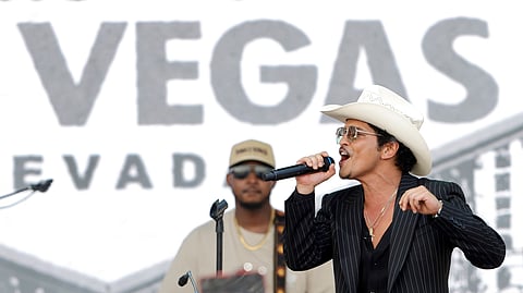 Bruno Mars performs for fans in Toshiba Plaza after a parade down the Las Vegas Strip Friday, April 10, 2026, in Las Vegas, on "Bruno Mars Day."
