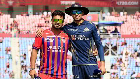 Gujarat Titans skipper Shubman Gill (R) and Lucknow Super Giants captain Rishabh Pant.