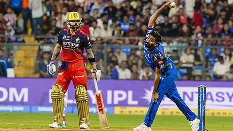 MI's Jasprit Bumrah bowls a delivery during an IPL 2026 T20 cricket match between Mumbai Indians and Royal Challengers Bengaluru, in Mumbai, Maharashtra, Sunday, April 12, 2026.
