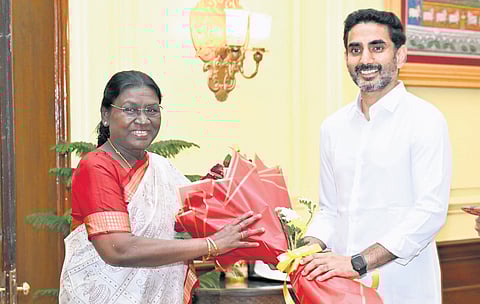 IT Minister Nara Lokesh greets President Droupadi Murmu on Monday.