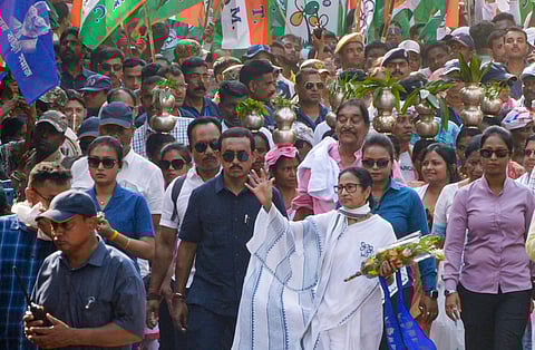 West Bengal Chief Minister Mamata Banerjee during a voter outreach in support of TMC candidate from Bankura constituency, Anup Mondal, ahead of the state Assembly elections, in Bankura Sadar Town, Monday, April 13, 2026.