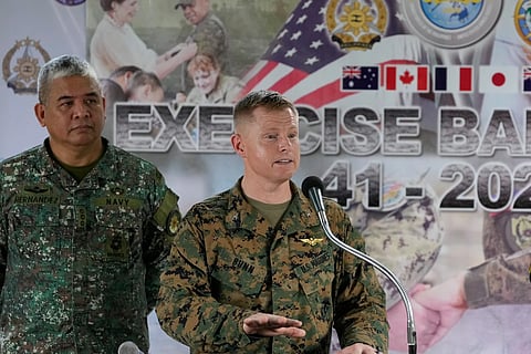 US Col. Robert Bunn, right, speaks beside Philippine Navy Col. Dennis Hernandez during a press conference for the upcoming joint military exercise dubbed "Balikatan" or "Shoulder to Shoulder" at Camp Aguinaldo military headquarters on Tuesday, April 14, 2026, in Quezon city, Philippines.