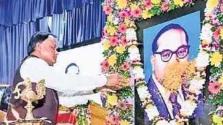CM Mohan Charan Majhi paying floral tribute to Dr BR Ambedkar at Jaydev Bhawan, on Tuesday.