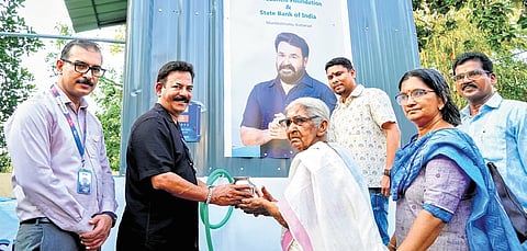ViswaSanthi Foundation MD Major Ravi inaugurating the drinking water project on Tuesday