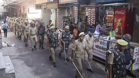 A heavy police presence was deployed as employees staged a sit-in at the factory gates.
