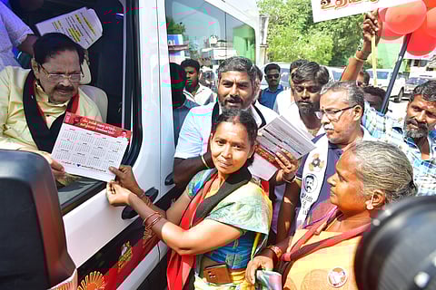 DMK’s Duraimurugan greeting supporters at Arimuthumottur.