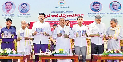 CM Siddaramaiah with Minister for Kannada and Culture Shivaraj Tangadagi, Shivajinagar MLA Rizwan Arshad and others during a book release event on Kannada Samarasya Nelegalu at Vidhana Soudha on Wednesday.