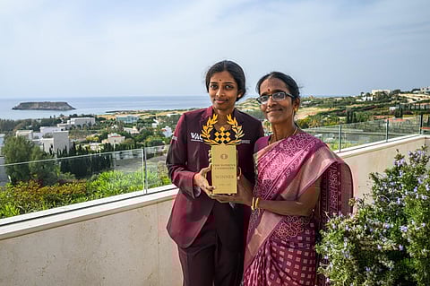 R Vaishali and her mother Nagalakshmi with the trophy