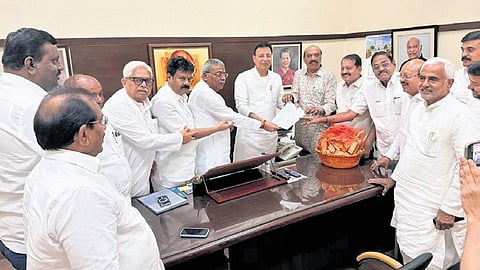 A delegation of Congress MLAs from Karnataka submit a memorandum to AICC General Secretary Randeep Singh Surjewala in New Delhi on Thursday.