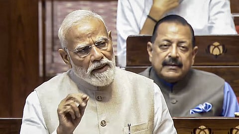 Prime Minister Narendra Modi speaks in the Rajya Sabha during the special session of Parliament in New Delhi, Friday, April 17, 2026.