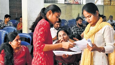 Enumerators and supervisors prepare to head out for the housing census at Jayanagar 4th block on Thursday.