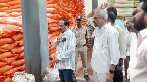 Civil supplies Corporation Chairman Thota Sudheer and Kakinada DSO Rudraraju Satyanarayana Raju inspected warehouses in Kakinada.