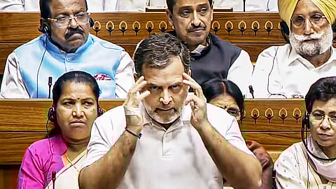 Leader of Opposition in the Lok Sabha Rahul Gandhi speaks in the House during the Special session of Parliament, in New Delhi, Friday, April 17, 2026. Congress MPs Kumari Selja and Imran Masood are also seen.