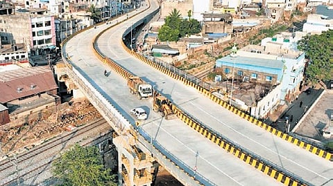 The structure features modern engineering elements, including steel girders, RCC precast components, POT-PTFE bearings, and modular expansion joints, ensuring enhanced safety and durability.