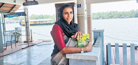 Fareena Kottapuram at the library at the Kottapuram houseboat terminal.
