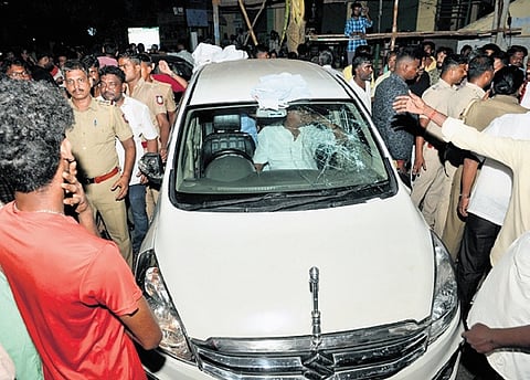 AIADMK functionaries smashed a car’s windshield in Coimbatore