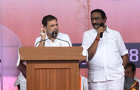 Congress leader Rahul Gandhi correcting the translation of Tamil Nadu Congress Committee Vice President Swarna Sethuraman during his campaign meeting at Thuraiyur in Tiruchy on Saturday.