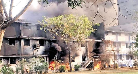 Smoke comes out of the Erythro pharmaceutical unit in Gaddapotharam Industrial Area, Sangareddy district, on Monday