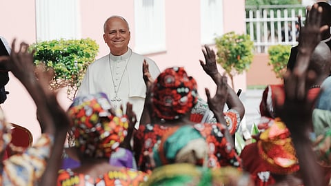 Pope Leo XIV is cheered by the faithful on the occasion of his visit to a nursing home in Saurimo, Angola, on Monday, April 20, 2026.