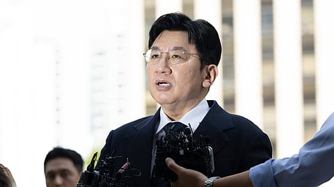 Bang Si-Hyuk, a chairman of HYBE answers reporters' question upon his arrival at the Seoul Metropolitan Police Agency in Seoul, South Korea, Monday, Sept. 15, 2025.