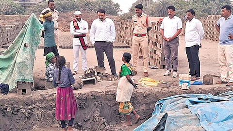 Sultanabad Junior Civil Judge Durgam Ganesh visits the family of the girl who died in a stray dog attack at a brick kiln in Peddapalli district on Tuesday