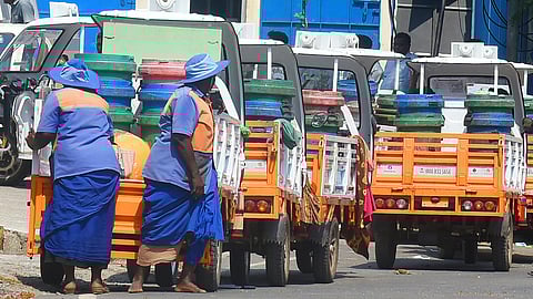 Braving the scorching summer heat, sanitation workers of the city carry on their essential duties, wearing protective caps as a shield against the sun.
